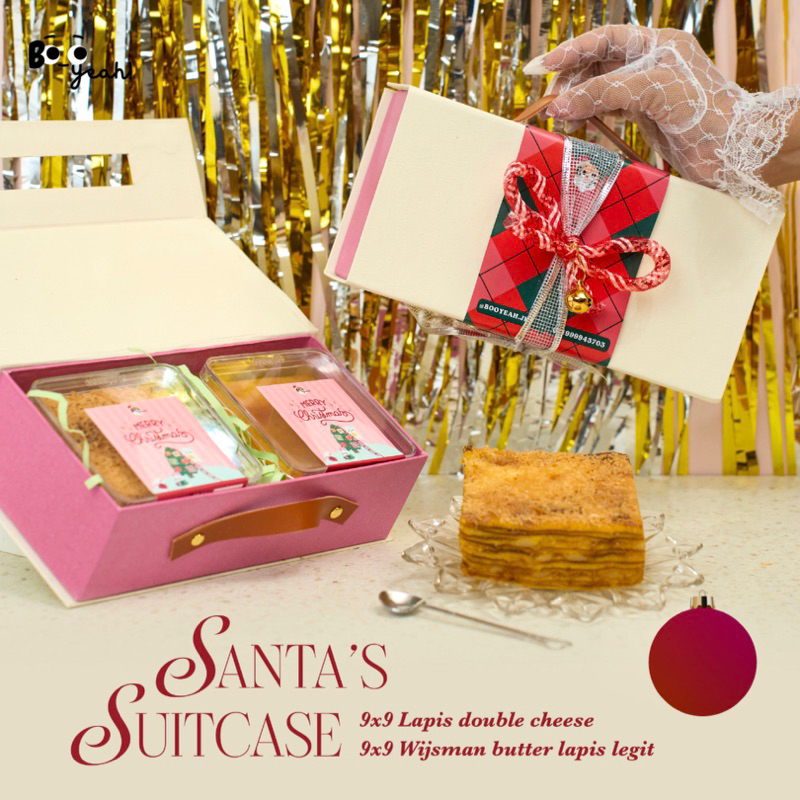 

SANTA’S SUITCASE CHRISTMAS HAMPERS