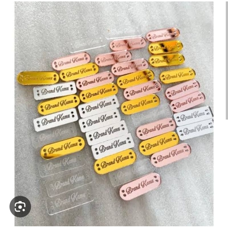 

label akrilik, label hijab, label baju, label brand produk