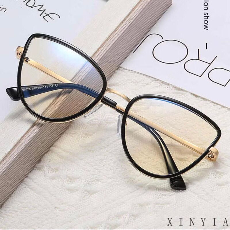 kacamata cat eye besi