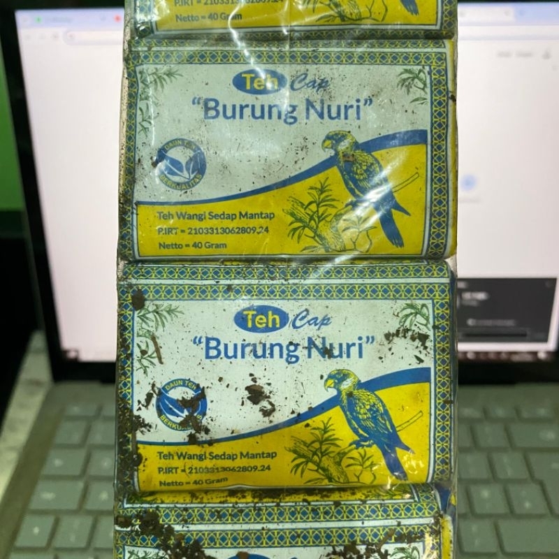 

TEH BURUNG NURI cap burung nuri teh kuning 40gr x 10 pcs