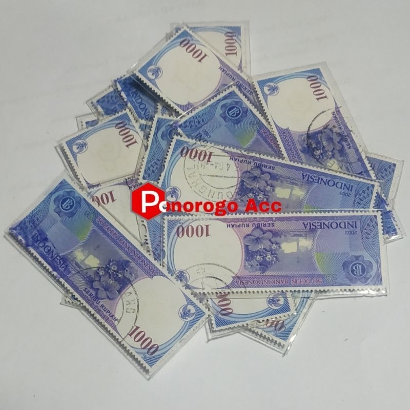 

Perangko lama Indonesia nominal 1000 peringatan 50 tahun bank indonesia tahun 2003 motif uang 1000 rupiah
