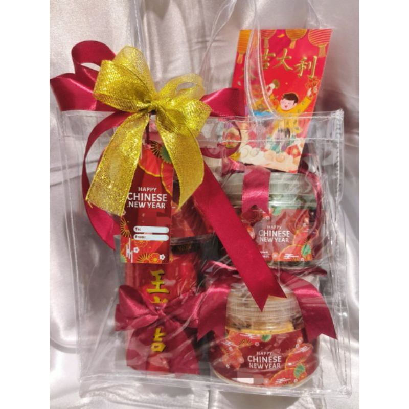 

Amidiko Parcell Hampers Paket Parcel Imlek Chinese New Year CNY Sincia dengan Angpao Kue Kering dan Teh Liang