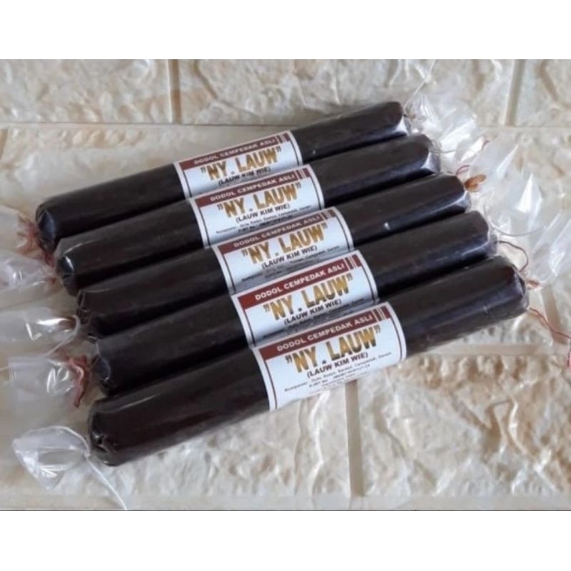 

Dodol Lapis Biasa Asli Tangerang Ny Lauw kemasan 1KILO ISI 4Pcs