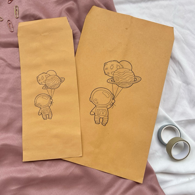 

Packaging Amplop Coklat motif Astronaut