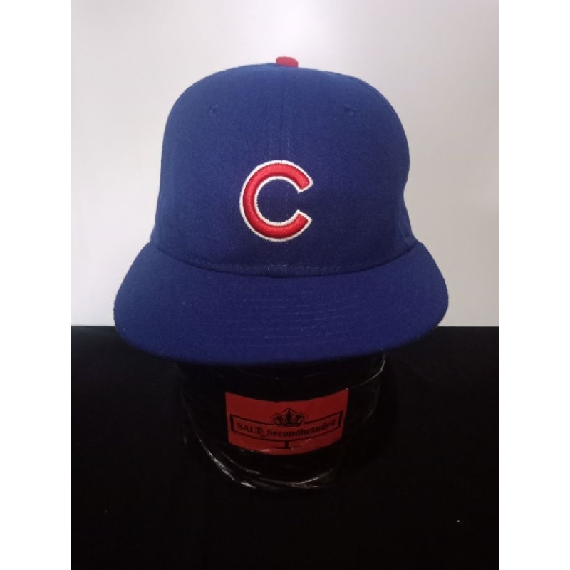Topi New Era logo C warna biru second