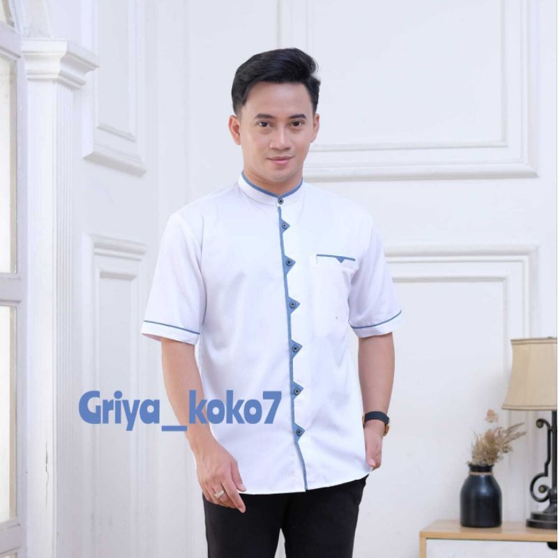 Baju Koko Lengan Pendek Warna Putih Kain Katun Toyobo Motif Shaka