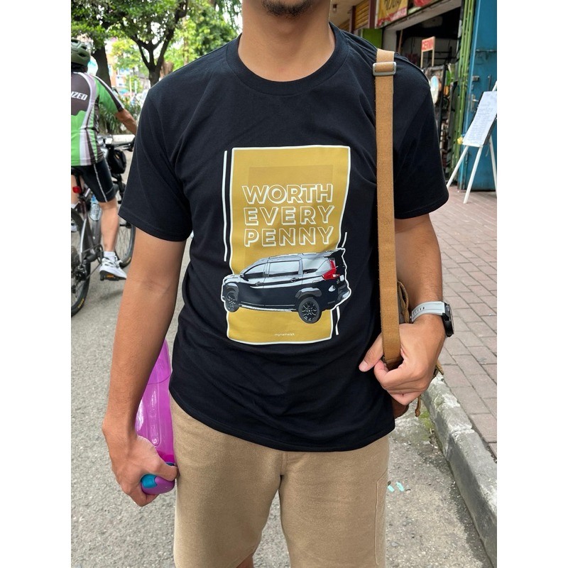 Merchandise Si X Kaos Hitam "Worth Every Penny"