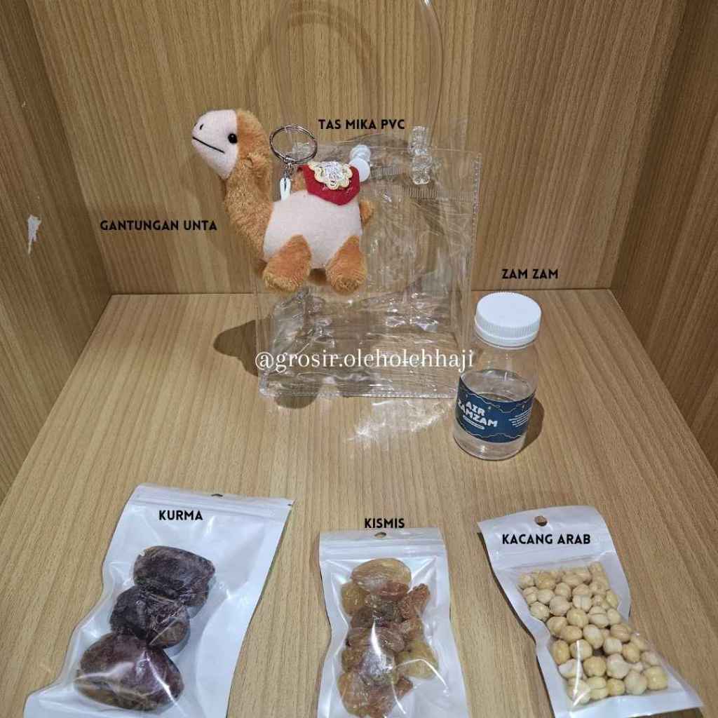 

Paket oleh oleh Haji Dan Umroh Eksklusif Tas Goodie Bag Totebag Transparan Hemat series Gantungan Kunci Unta dan Kabah
