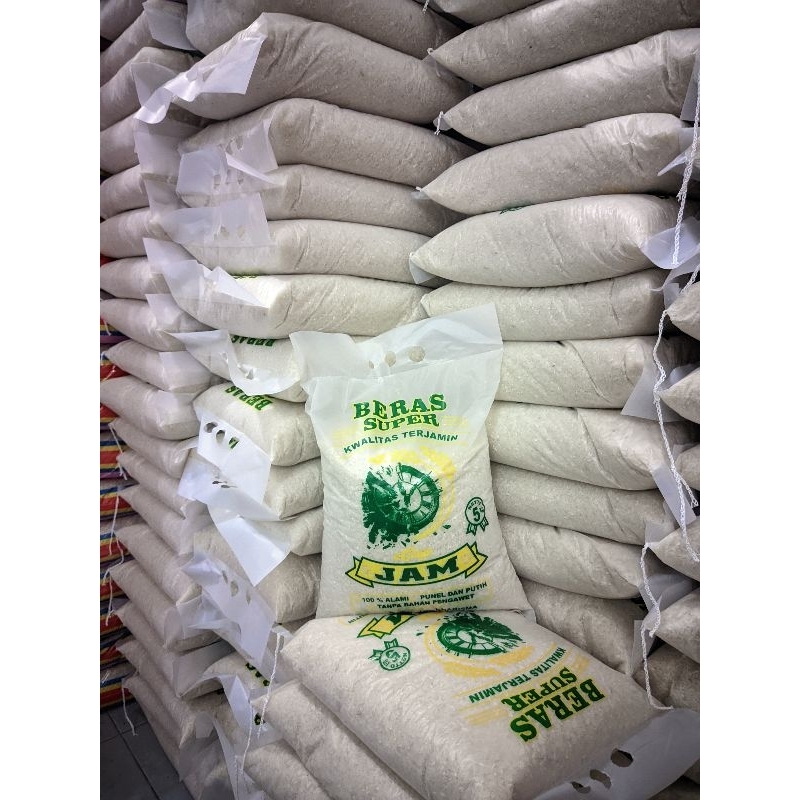 

Beras Super cap Jam 5kg putih dan punel alami