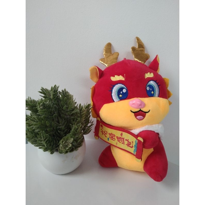 Boneka Shio naga lucu