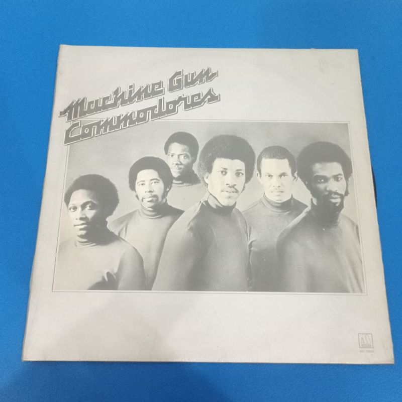 Piringan Hitam Machine G un Commodore