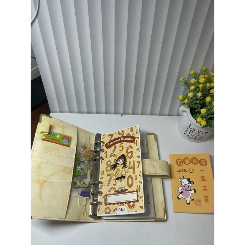 

preloved binder saving book kulit