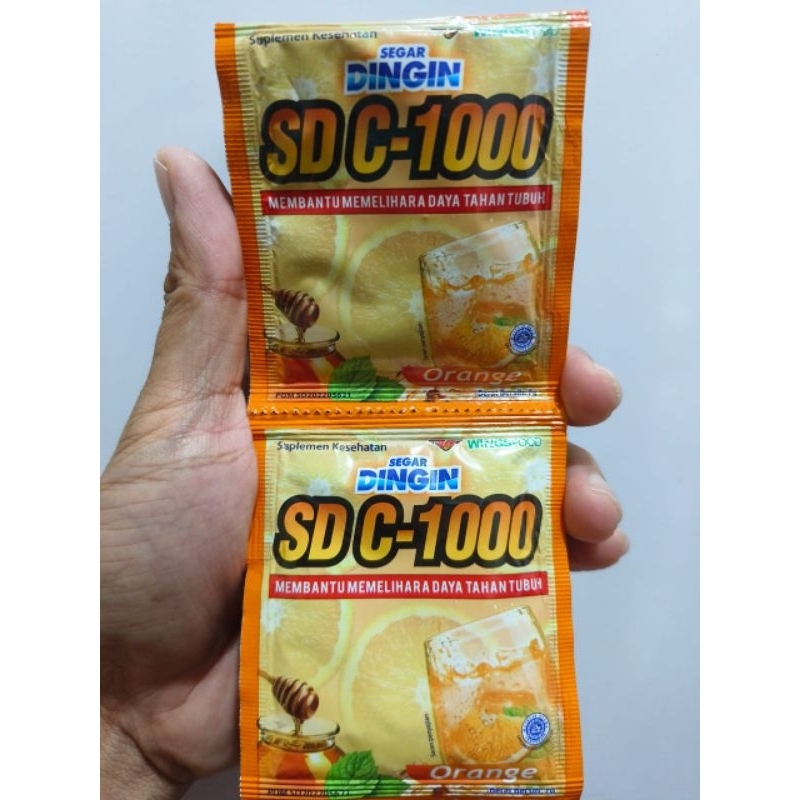 Segar Dingin C-1000 Rasa Orange 1 Renceng isi 12 Sachet