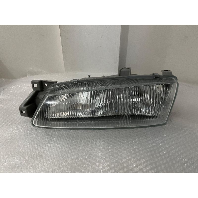 Lampu depan headlamp kia timor kiri