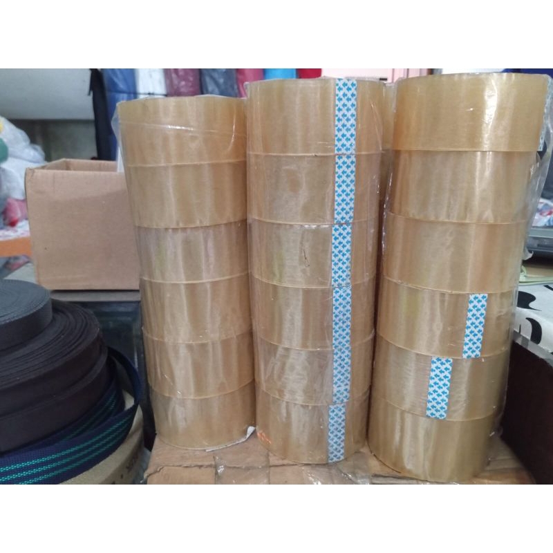 

lakban bening cocok buat paking paket per pak isi 6