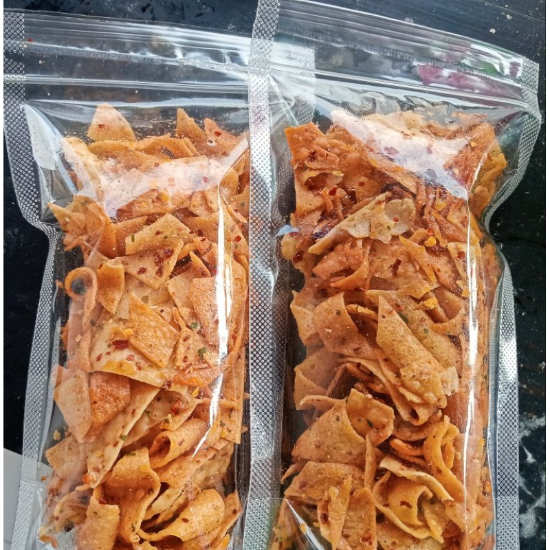 

PANGSIT KERIPIK 250Gram PEDAS DAUN JERUK