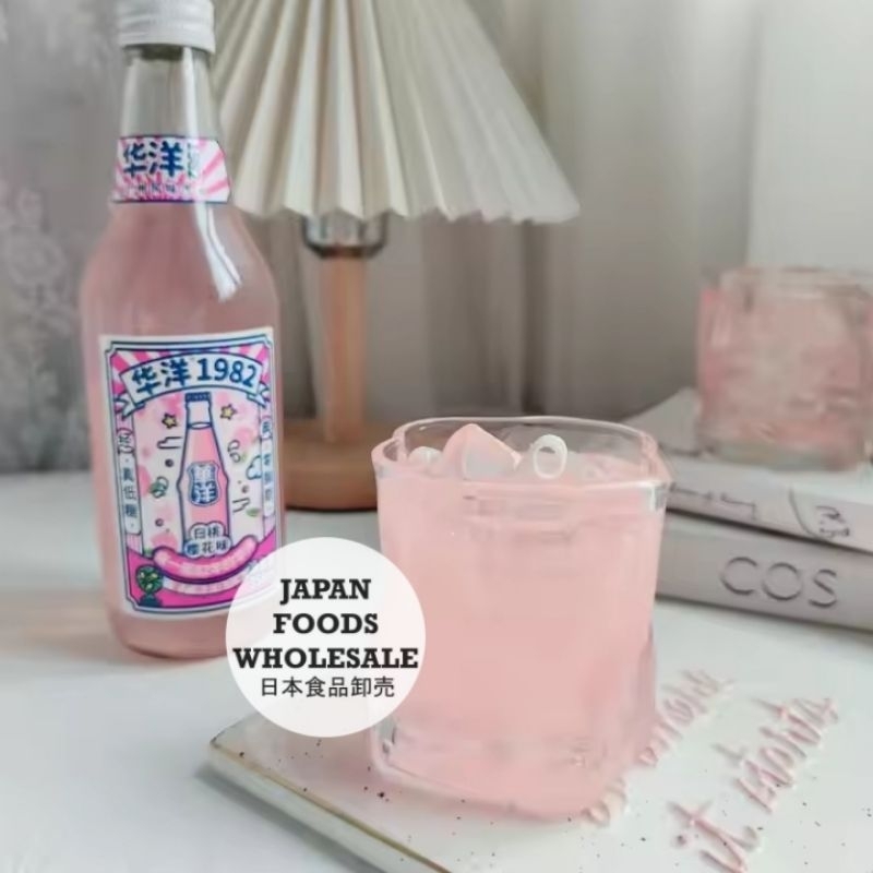 

Huayang Carbonated Drink White Peach Sakura Flavor / soft drink / minuman impor