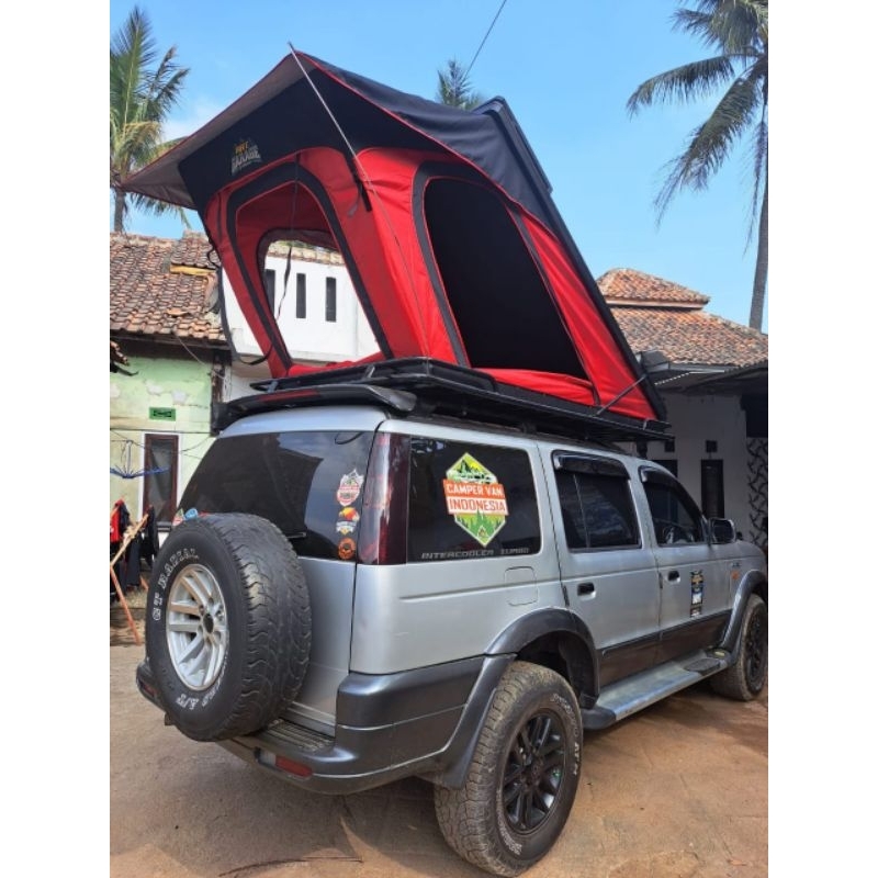 Rooftop tent custom by TEJA GARAGE  model hard case tenda di atas mobil camping car