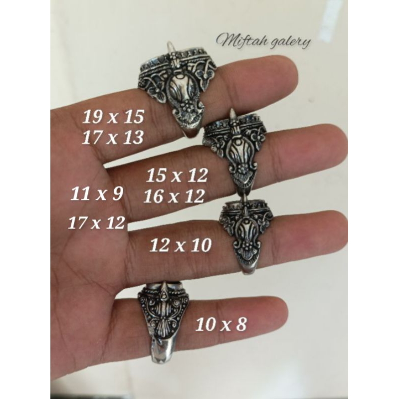 Emban alpaka motif ukir bali