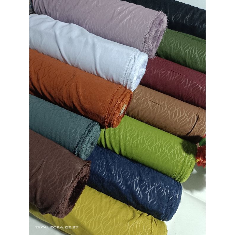 Kain Wolfis Embos grade A premium MOTIF DAUN GARIS GARIS meteran