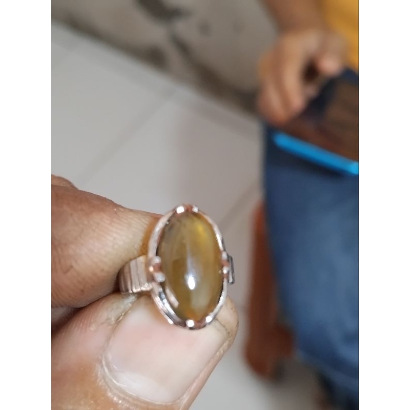 cincin batu solar bahan koin singapore