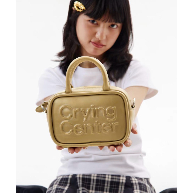 CRYING CENTER BAG-GOLD HAND BAG