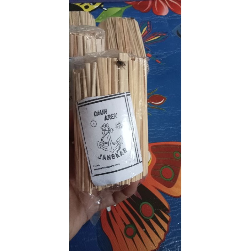 

Daun Aren kering perbungkus isi 100@,