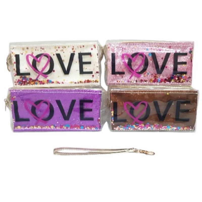 

Tempat Pensil transparan Seleting Glitter Manik Love