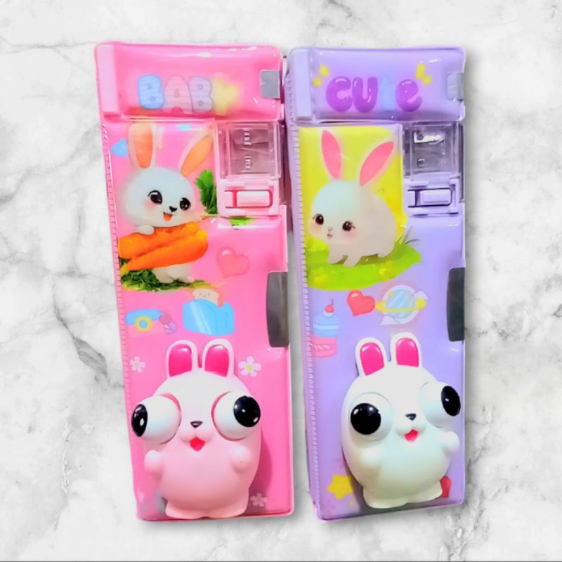 

PENCIL CASE/tmpat pincil magnet.boneka mata timbul+serutan