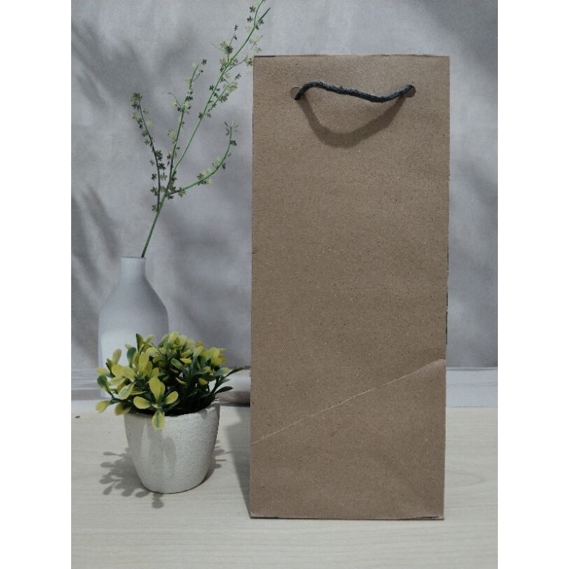 

PAPERBAG BOTOL 10X10X25 PAPERBAG SOUVENIR