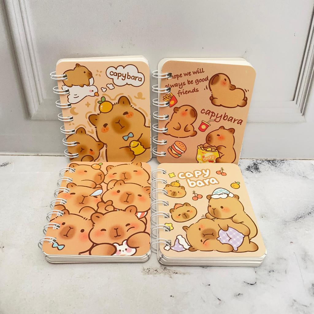 

Buku Spiral Capybara Ukuran A7 Kertas Bergaris / Buku Tulis Mini CAPYBARA Ukuran A7 Super Cute Lucu Alat Tulis Sekolah Anak Kekinian Kualitas Terbaik Bisa Grosir dan COD
