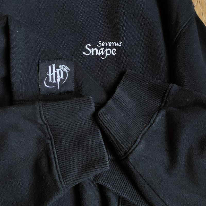 Sweater crewneck Harry Potter Slytherin original. Second