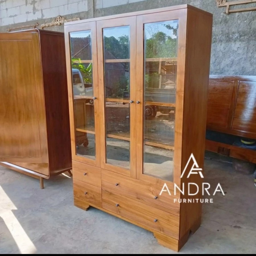 almari buku kayu jati 3 pintu kaca 4 laci minimalis modern,lemari hias