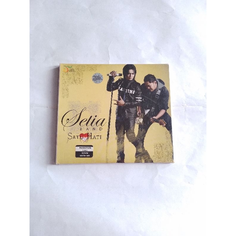 kaset cd audio lagu setia band satu hati  (baru)