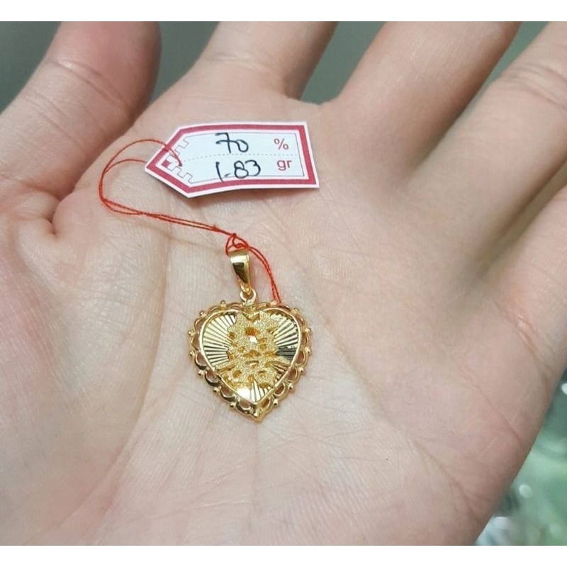 Liontin emas 70 xuang xi hati renda