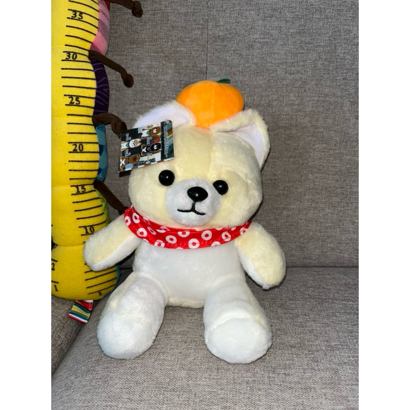 Boneka guguk shiba jeruk amuse