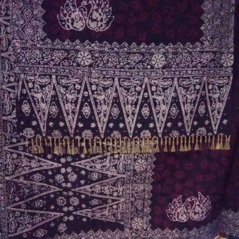 kain batik Jambi + tekuluk ronce ekor seluang