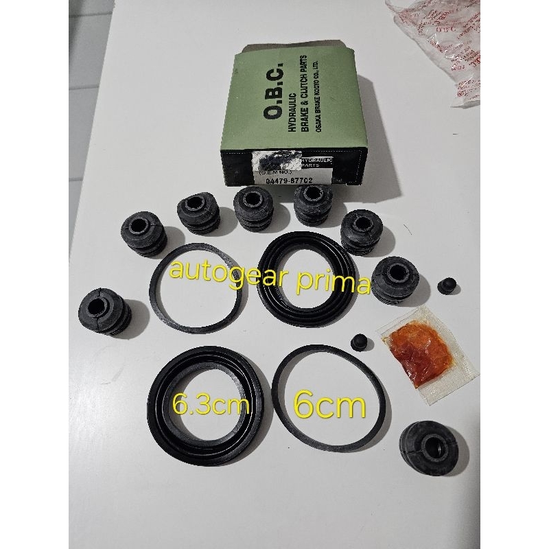 karet rem cakram caliper kit charade G11 obc 04479-87702
