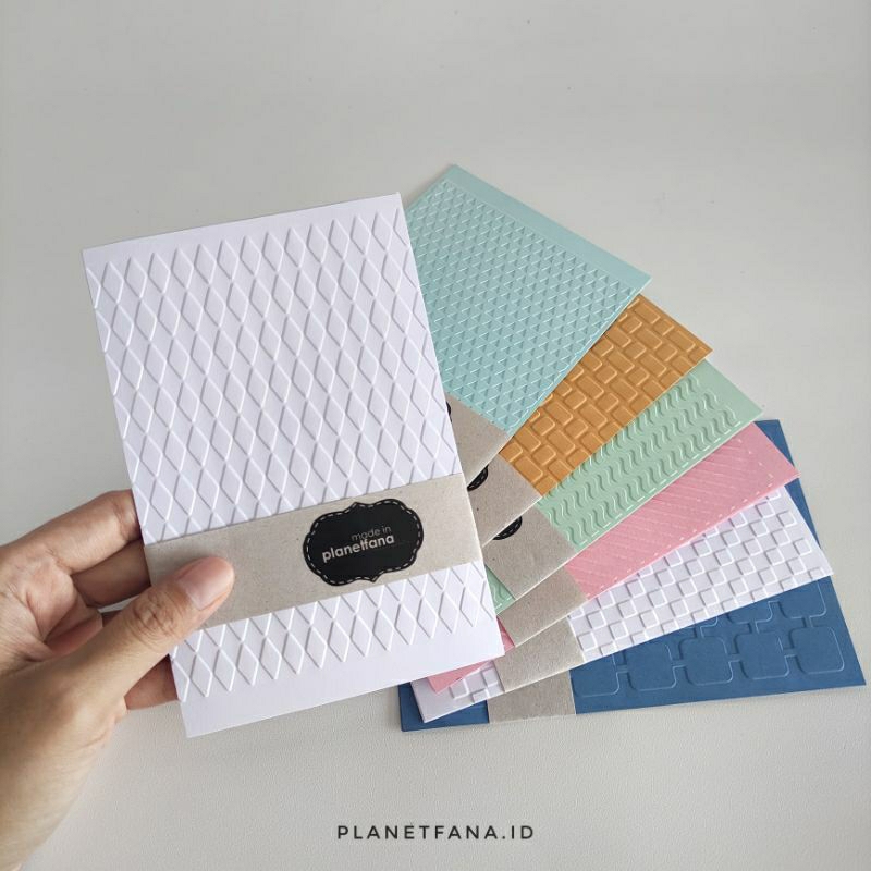 

planetfana • Kertas emboss motif simetris