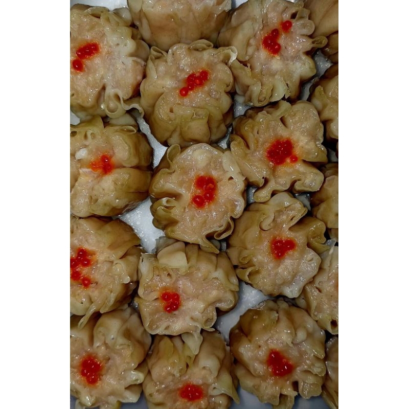 

Dimsum Ayam isi 18 sudah termasuk saus