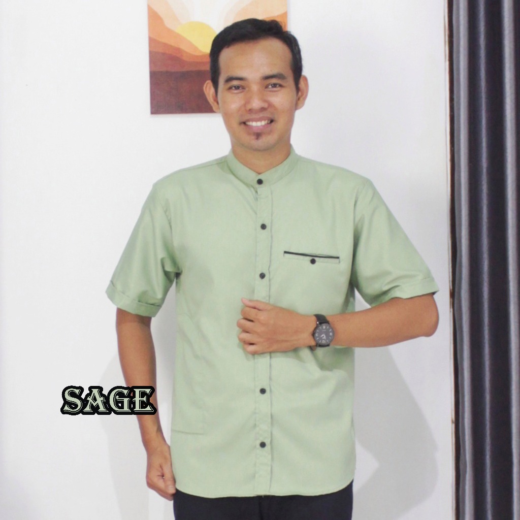 Baju Koko Lebaran Pria Muslim Hijau Sage Lengan Pendek Kain Toyobo Kerah Sanghai Moderen