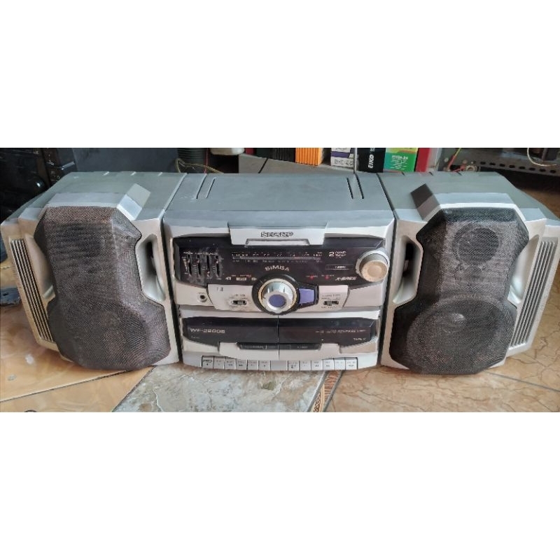 HEAD SHARP SIMBA saja, tanpa salone, radio normal,tape kadang play lancar,kadang anjlekan..cek vedeo