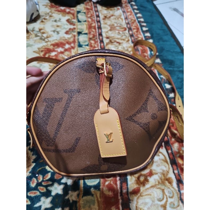 tas selempang Lv bulat