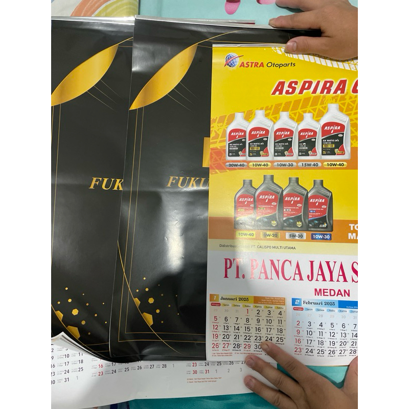 

Kalender Dinding 2025