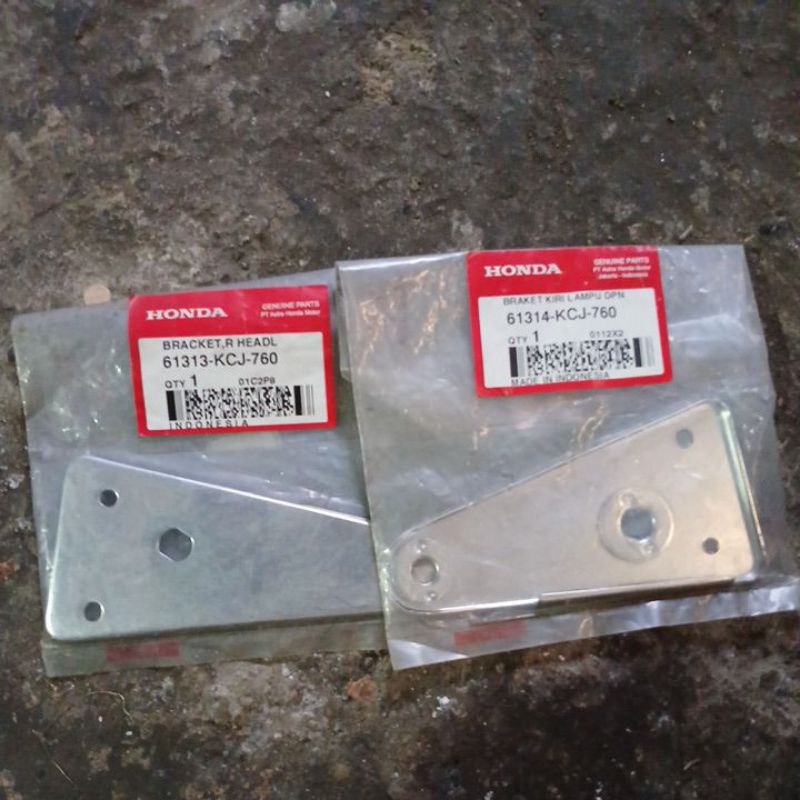 Kupingan lampu,pangkon lampu  honda tiger lama tiger 2000, original baru AHM