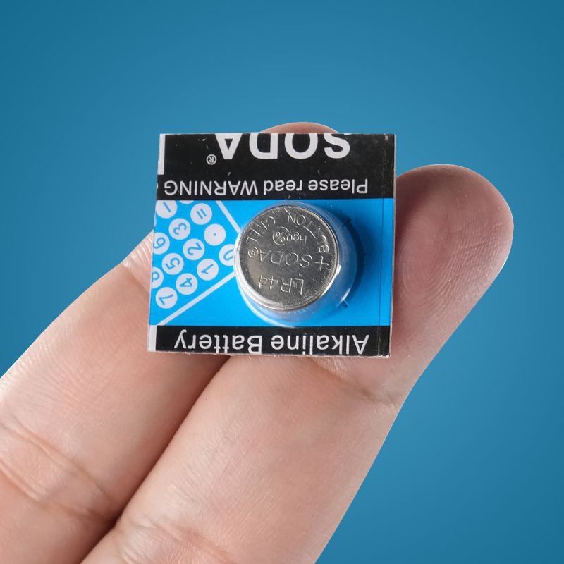 Baterai kancing LR44