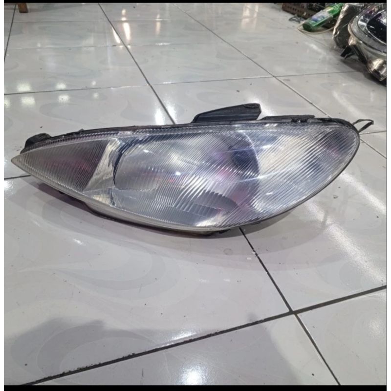 headlamp Peugeot 206 original. lampu depan Peugeot 206 kiri