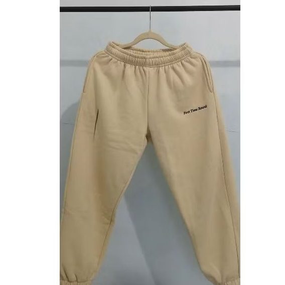 first time round trackpants buttercream