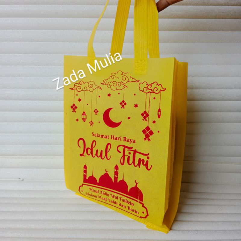 

Tas Parcel Lebaran Idul Fitri , Haji Umroh Tebal 12 pcs Uk. 25x35 cm, Goodie Bag Kain Spunbond Press