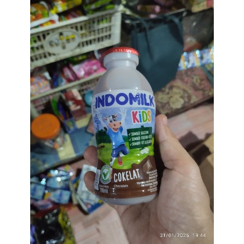 

susu botol Indomilk coklat